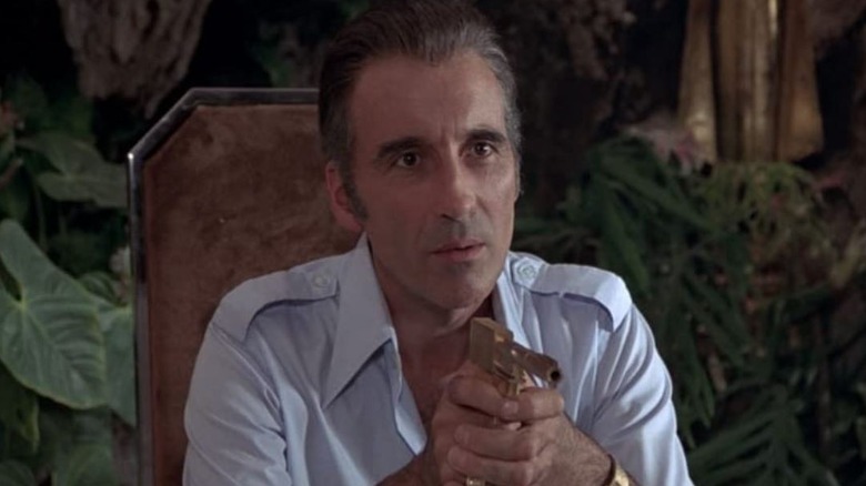 Christopher Lee points gun