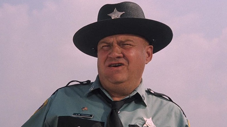 Clifton James looking baffled