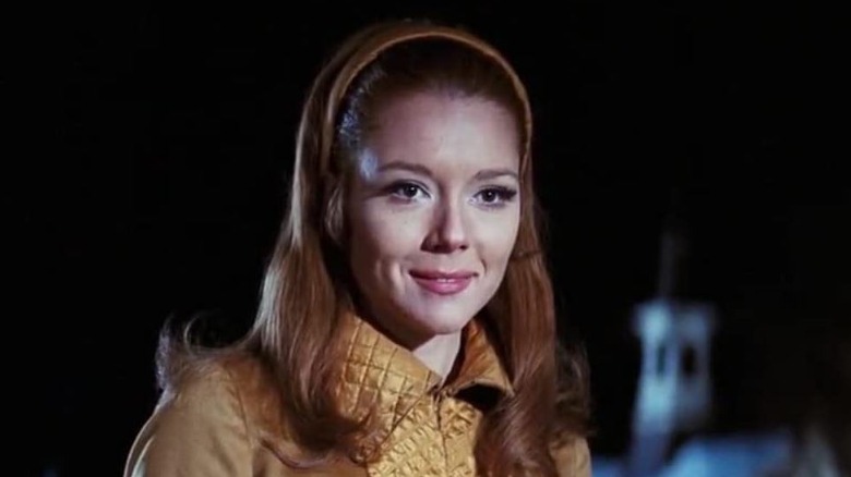 Diana Rigg smiles