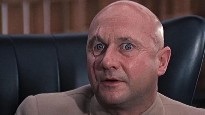 Donald Pleasence threatens