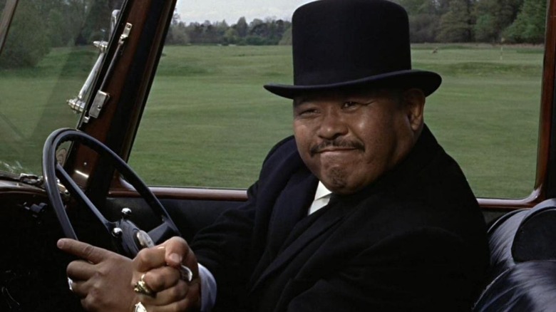 Oddjob crushes golf ball