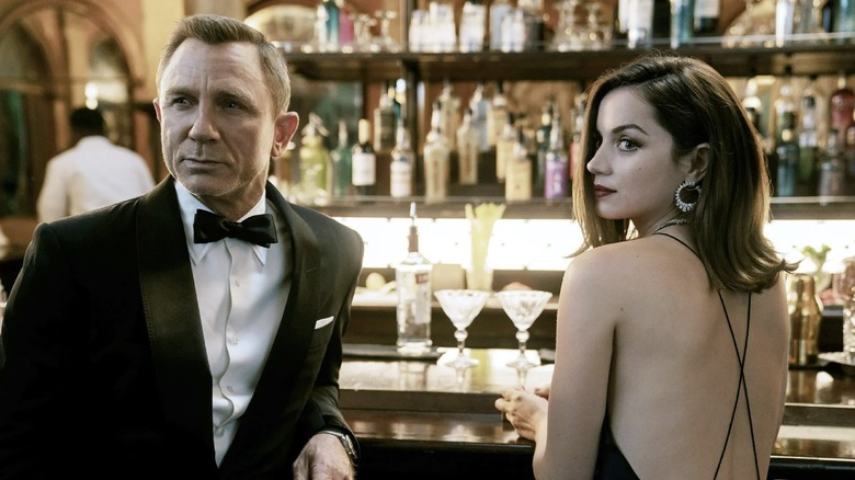 Bond and Paloma at bar