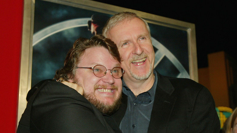 Guillermo del Toro and James Cameron hugging for a photo