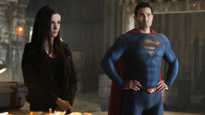 Lois Lane standing next to Superman