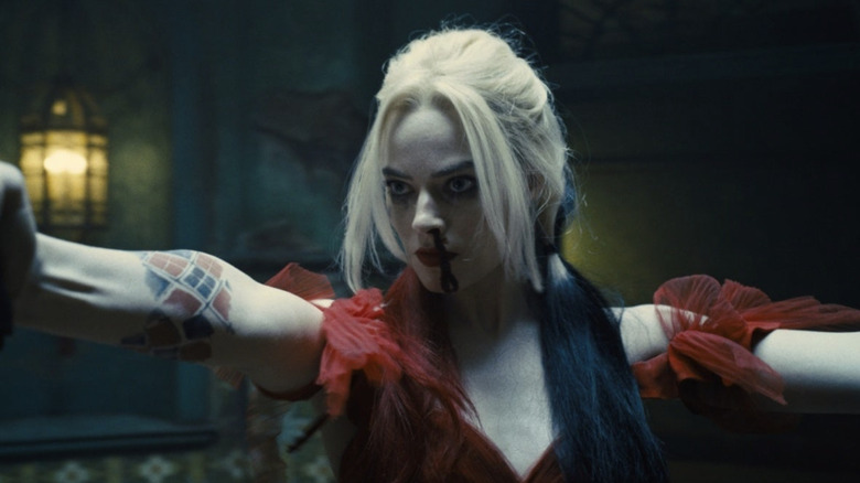 Harley Quinn stretching her arms