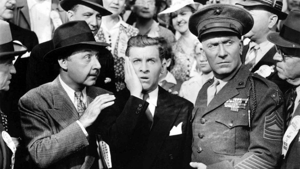 Eddie Bracken (center) as Woodrow Lafayette Pershing Truesmith