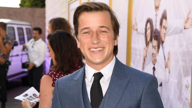 Skyler Gisondo smiling at event