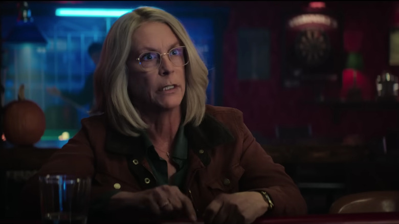 Jamie Lee Curtis in a bar