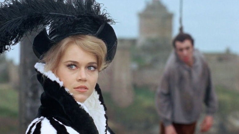 Jane Fonda watches a hanging man