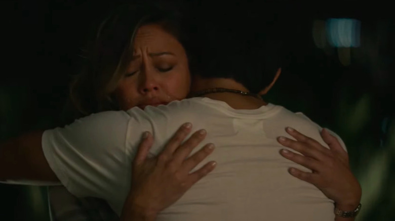 Jane tearfully hugging Alex