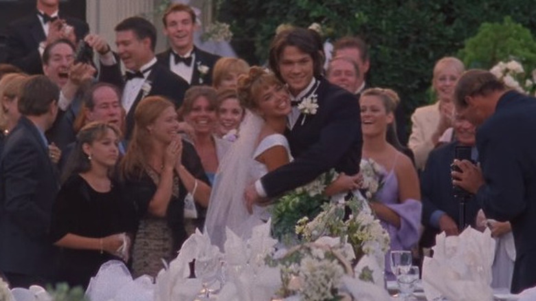 Jared Padalecki and Arielle Kebbel looking happy as Dean and Lindsay