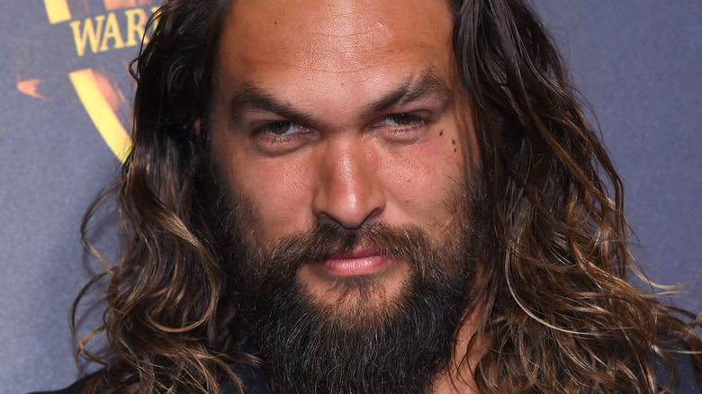 Jason Momoa smirking