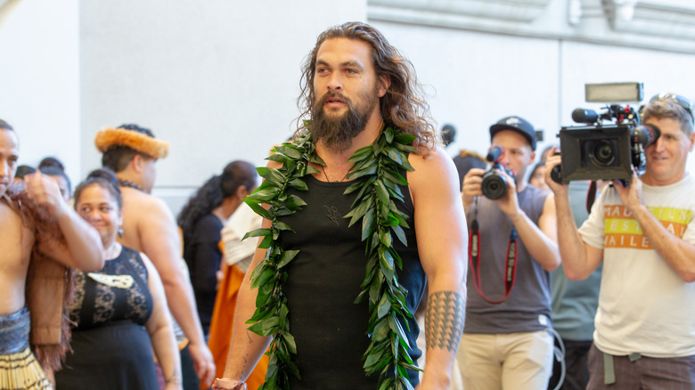 Jason Momoa wearing lei