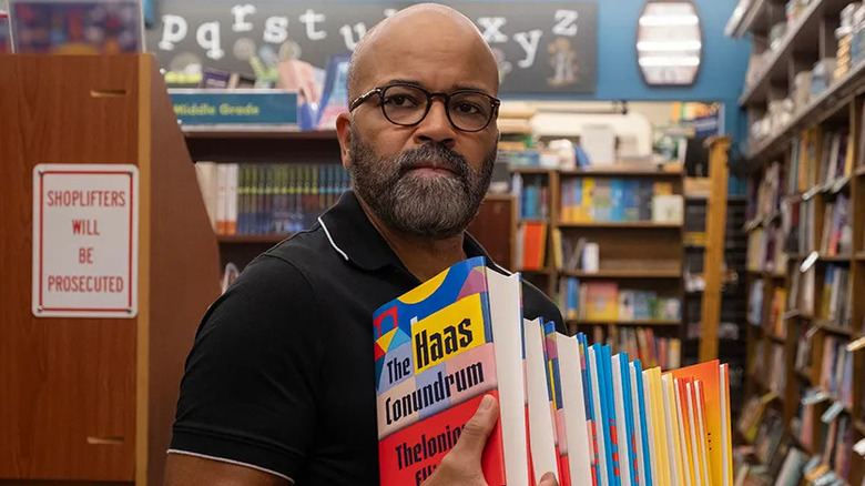 Monk holding books 