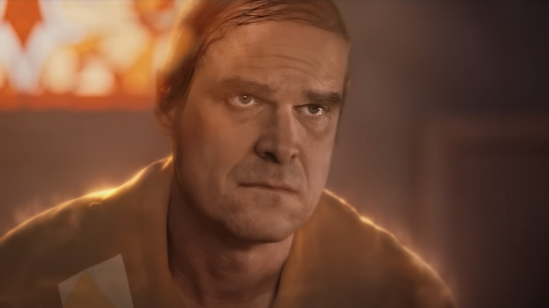 David Harbour looking solemn in We Have a Ghost