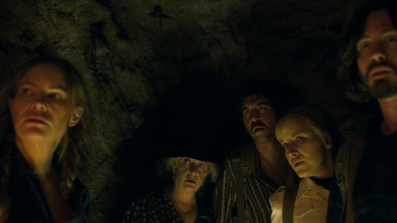 Chava and group in cave