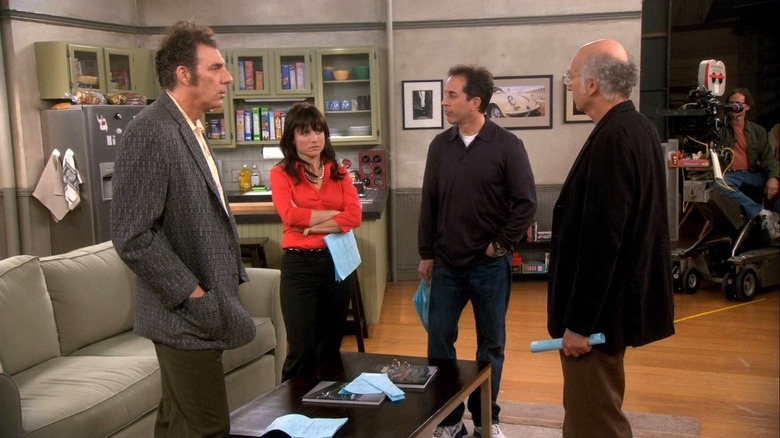 Richards, Louis-Dreyfus, and Seinfeld stand next to David