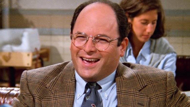 George Costanza smiling at diner