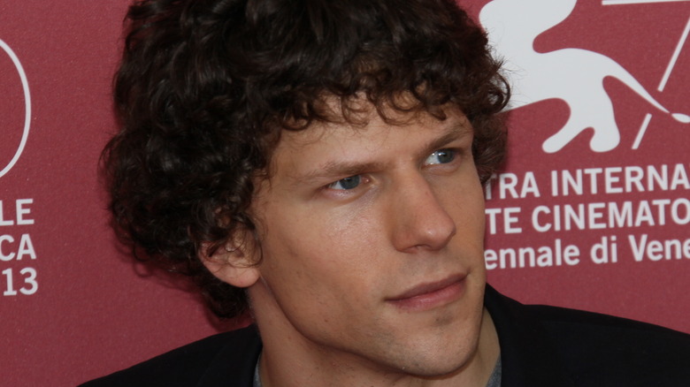 Jesse Eisenberg looking off camera