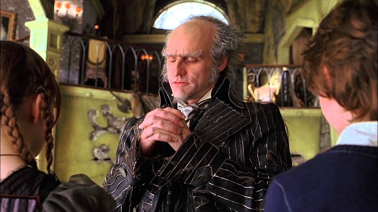 Count Olaf plotting a scheme