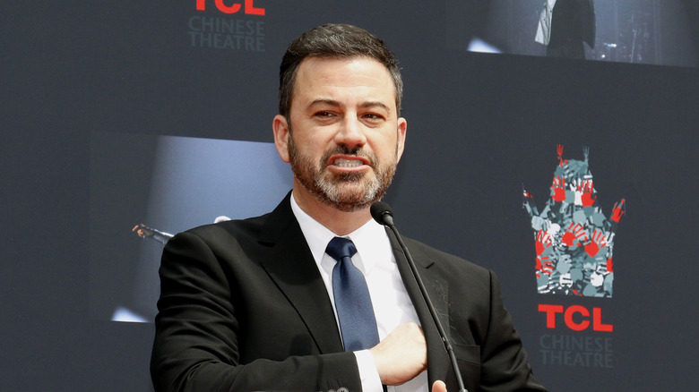 Jimmy Kimmel speaking into a microphone