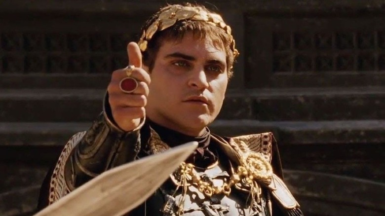 Commodus holding his thumb up