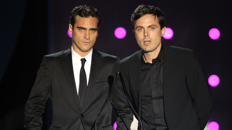 Joaquin Phoenix and Casey Affleck presenting