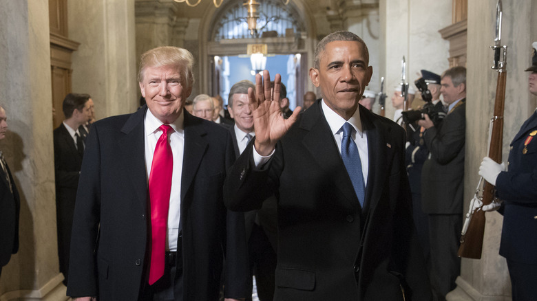 Donald Trump and Barack Obama walking