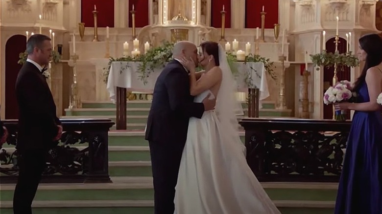 Joe Cruz kissing his bride