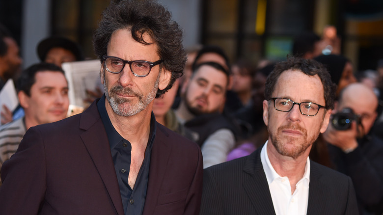 Joel and Ethan Coen in front of a crowd