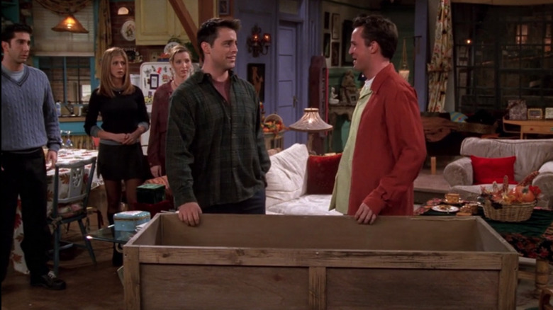 Joey Tribbiani and Chandler Bing with the box