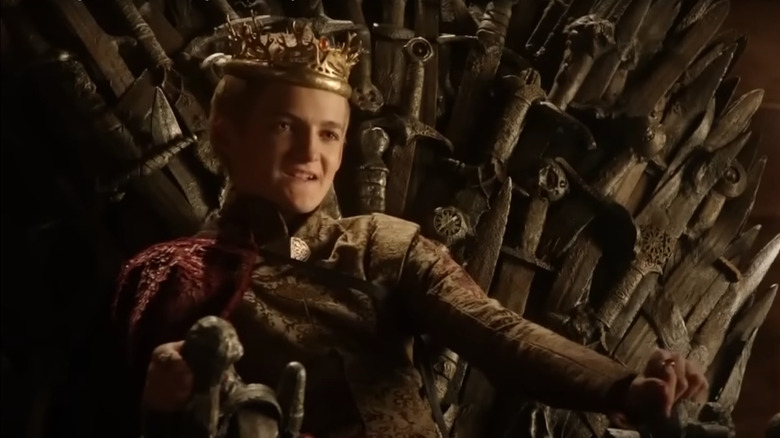 Joffrey grimaces from the throne