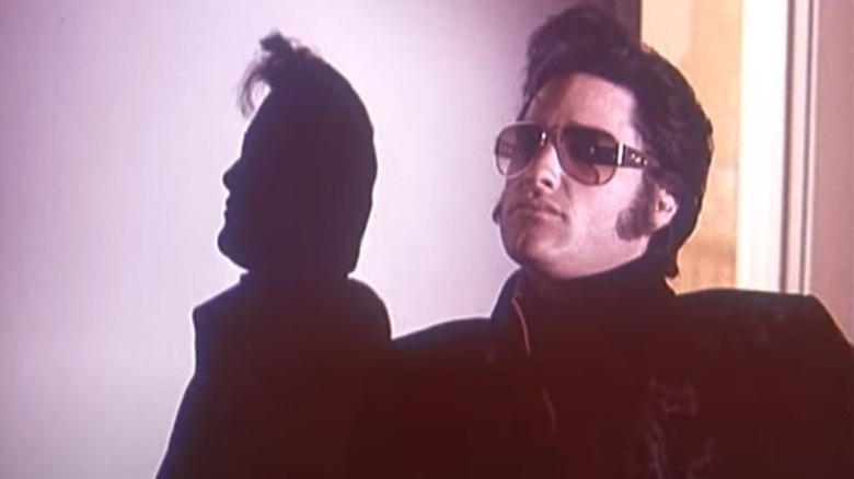 Elvis wearing sunglasses