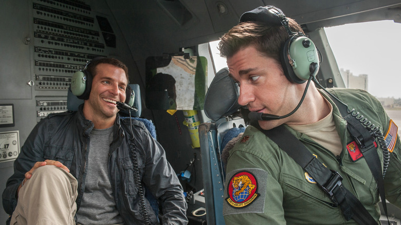 Brian and Woody in a plane cockpit