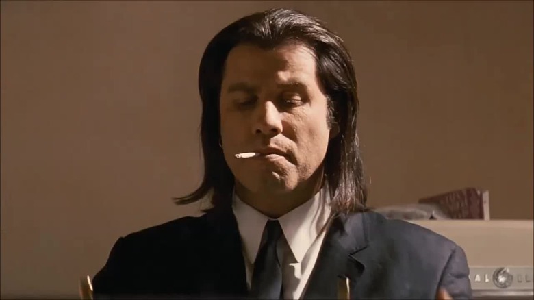 Travolta as Vincent Vega