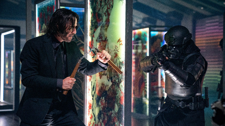 John Wick fighting assassin