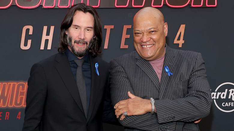 Keanu Reeves and Laurence Fishburne John Wick event blue pin