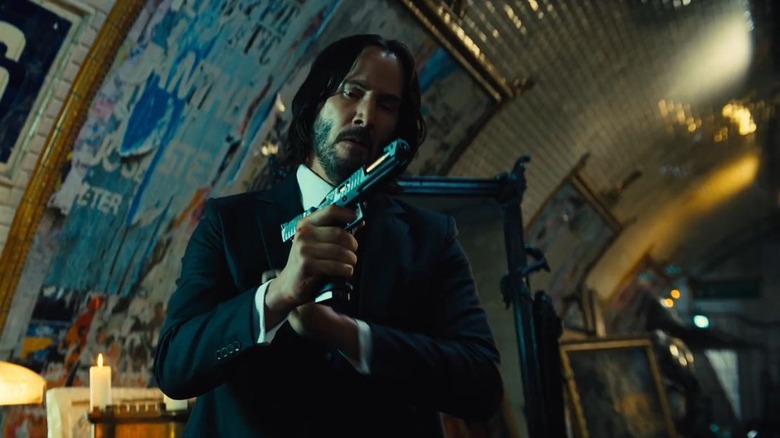 John Wick loading gun