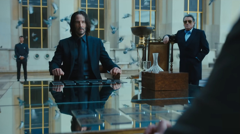 John Wick sitting