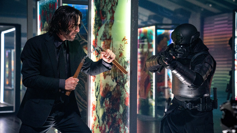 John Wick fighting assassin