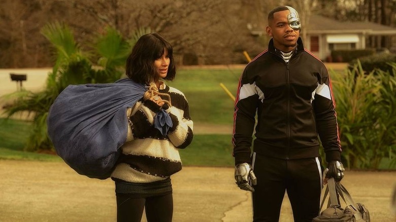 Crazy Jane and Cyborg carrying luggage on Doom Patrol