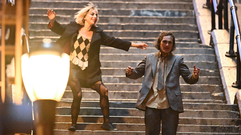 Harley and Joker dance on steps