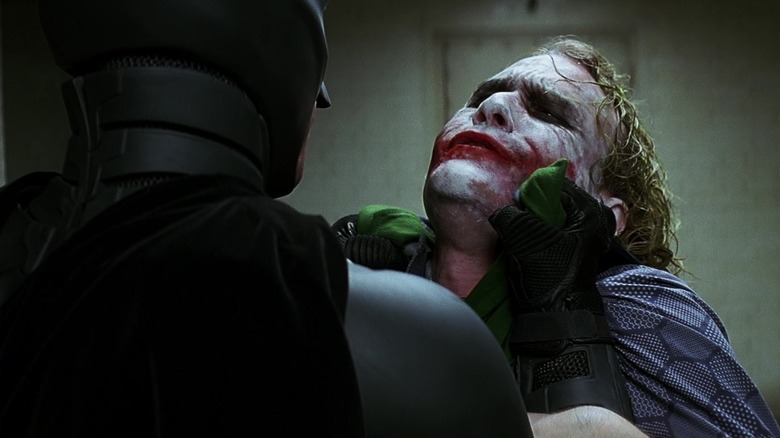 Batman threatening the Joker