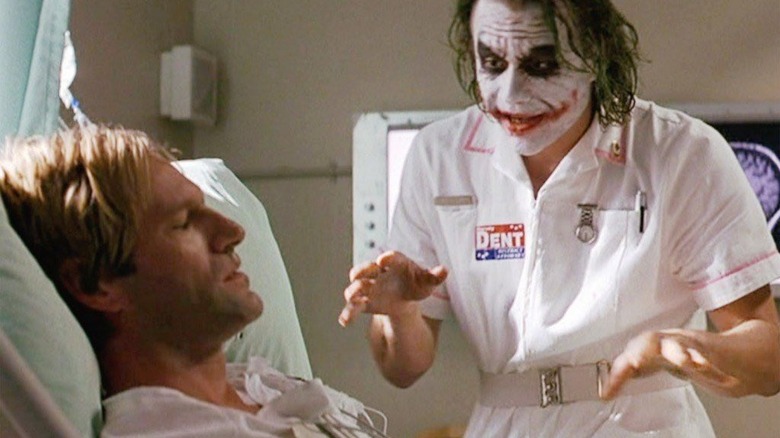 Nurse Joker manipulates Harvey Dent