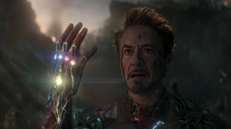 Tony Stark holding the Infinity Stones 