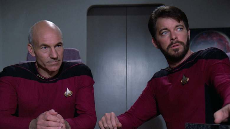 Picard and Riker sitting together