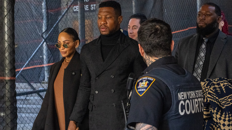 Jonathan Majors walking