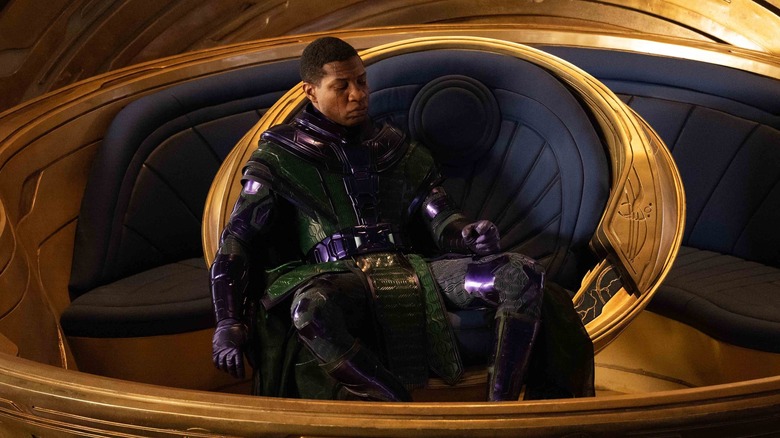 Kang the Conqueror sitting in circular chair