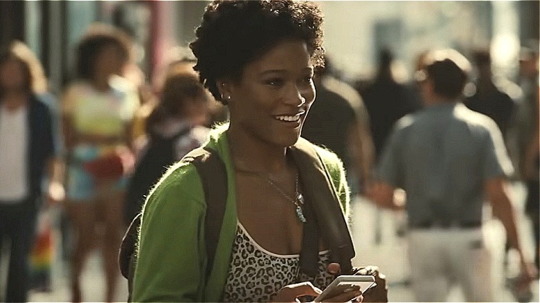 Emerald Haywood smiling on the street in Nope