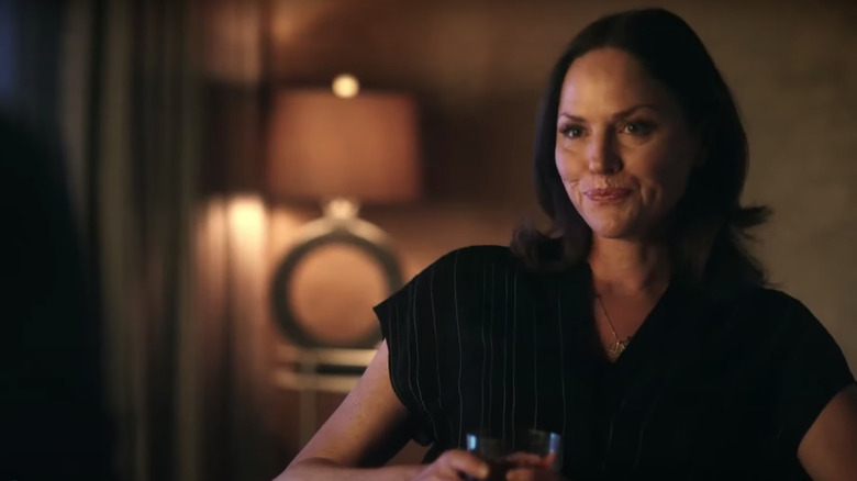 Jorja Fox holding a glass